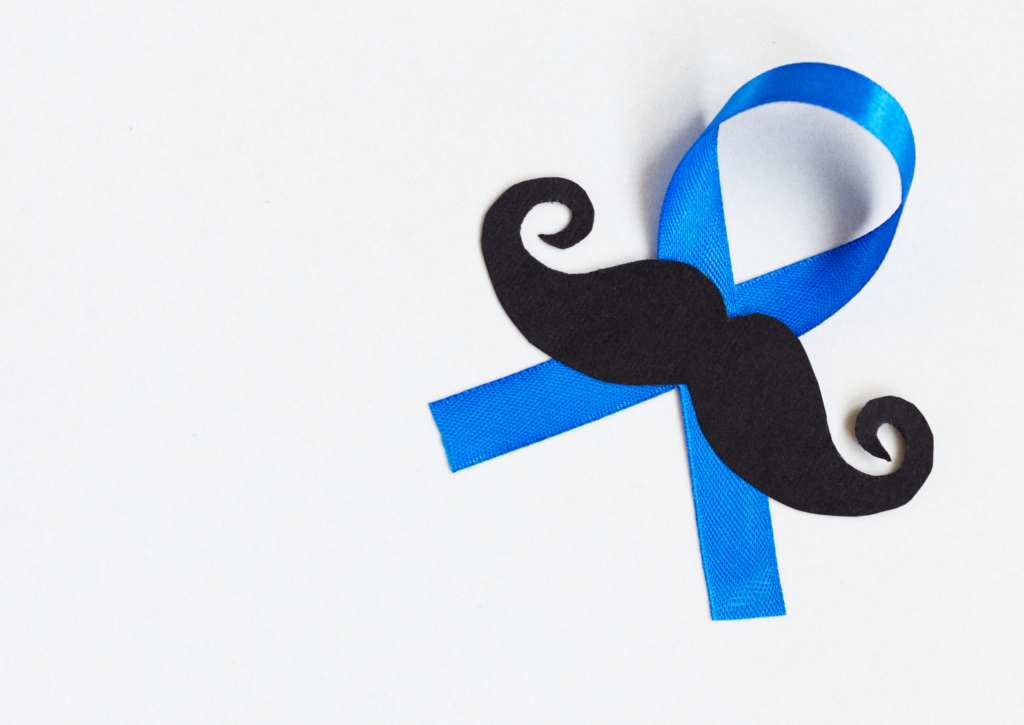 Black moustache on a blue ribbon, symbolising men's health and Movember.